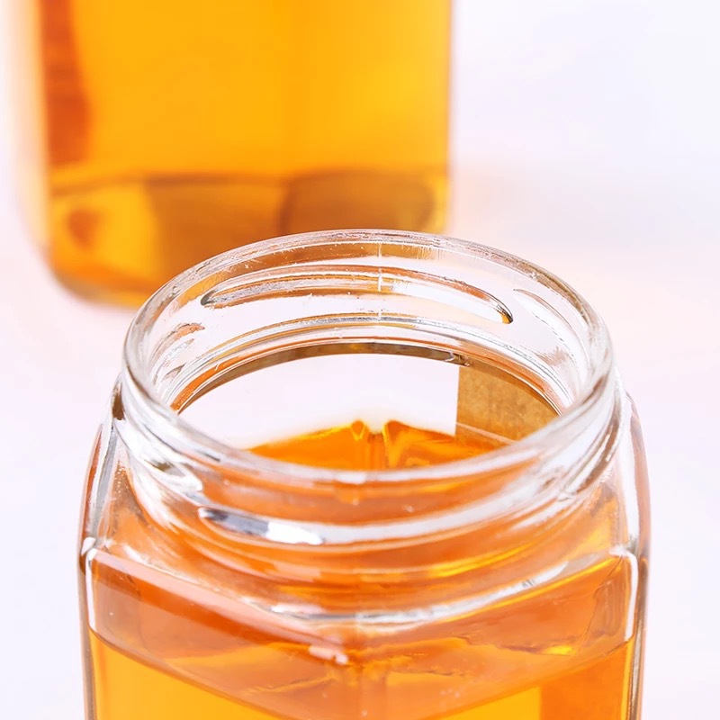 High quality wholesale honey spoon jar, hexagon honey jar