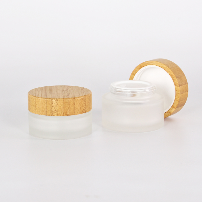 Hot Eco-friendly 5ml 15ml 30ml 50ml 100ml clear frosted glass jar with bamboo wood lid