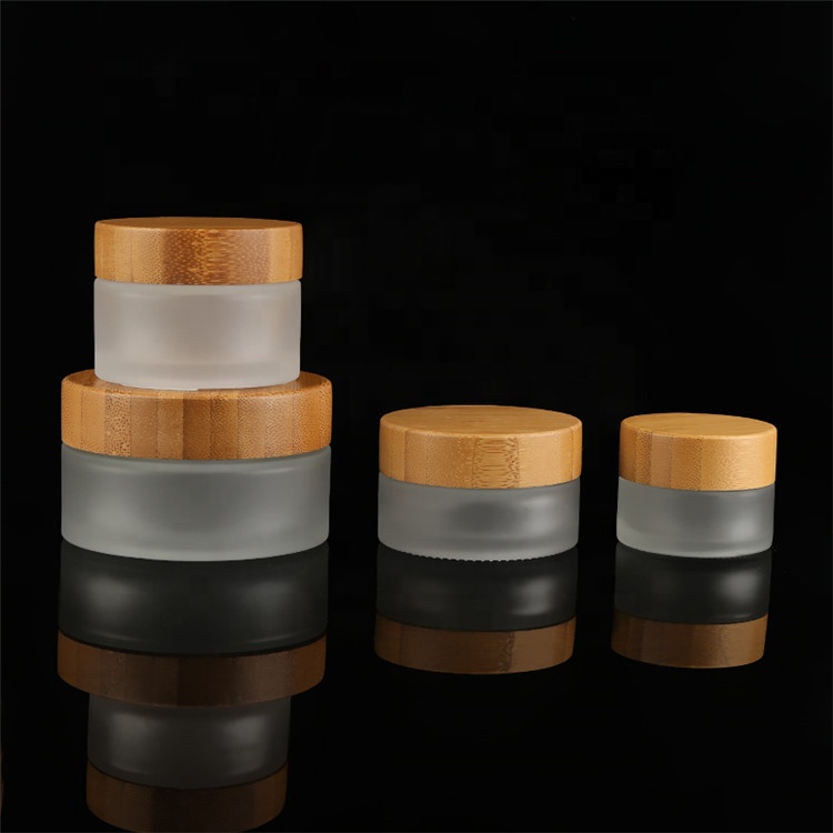 Hot Sale 100ml clear frosted glass jar bamboo lid with plastic inner bamboo cream jar bamboo jar
