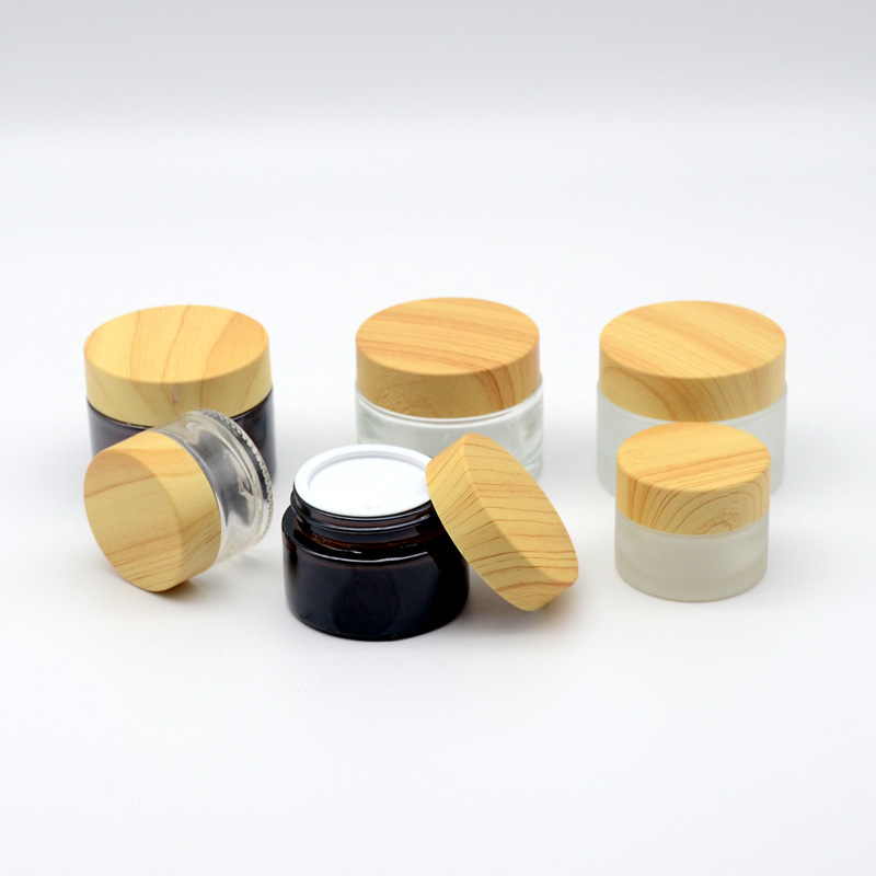 Hot Sale Eco Friendly 30g 50g 100g Empty Matt Frosted Wooden Bamboo Lid Cap Glass Cosmetic Jars