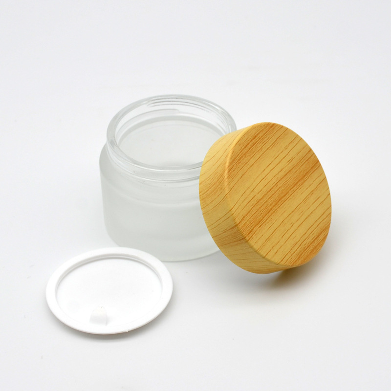 Hot Sale Eco Friendly 30g 50g 100g Empty Matt Frosted Wooden Bamboo Lid Cap Glass Cosmetic Jars