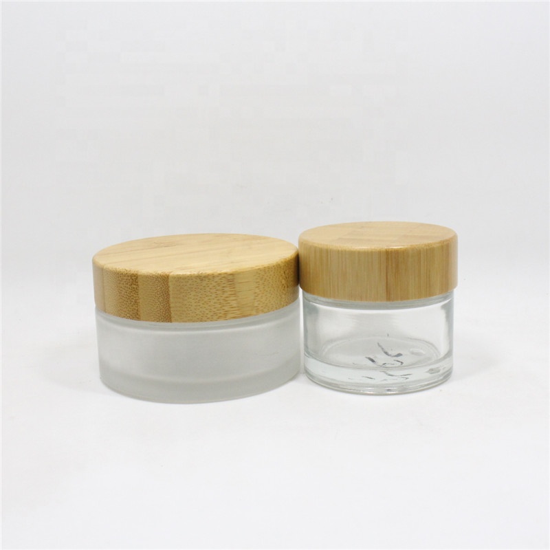 Hot Sale Eco Friendly Custom Logo 50g 100g Empty Matt Frosted Wooden Bamboo Lid Glass Cosmetic Jars