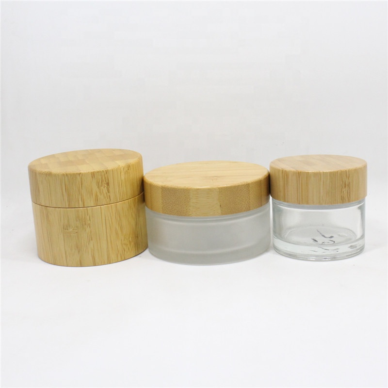 Hot Sale Eco Friendly Custom Logo 50g 100g Empty Matt Frosted Wooden Bamboo Lid Glass Cosmetic Jars