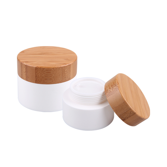 Hot Sale Eco Friendly Custom Logo 50g 100g Empty White Matt Frosted Wooden Bamboo Lid Cap Glass Cosmetic Jars