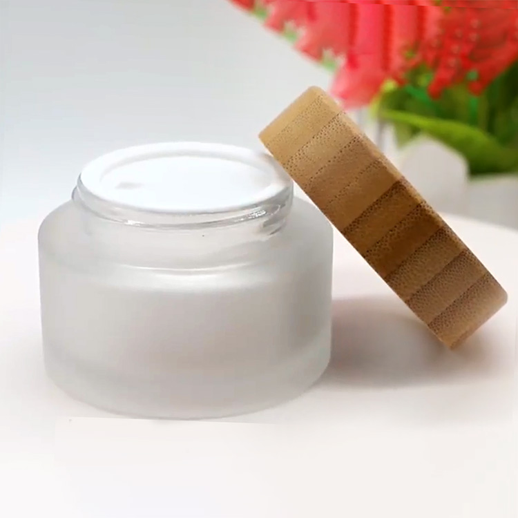 Hot Sale Eco Friendly Custom Logo 50g 100g Empty White Matt Frosted Wooden Bamboo Lid Cap Glass Cosmetic Jars