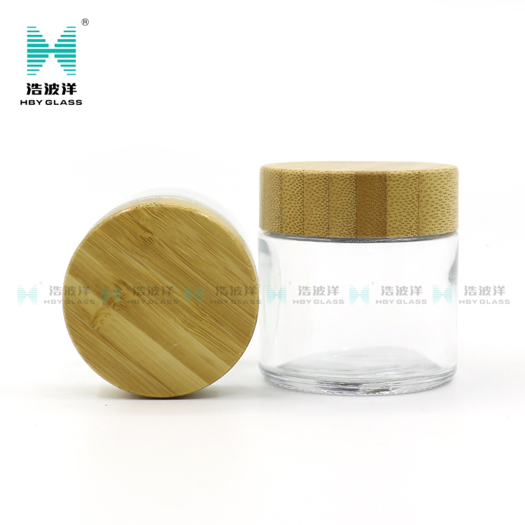 Hot Sale Eco Friendly Custom Logo 50g 100g Empty White Wooden Bamboo Lid Cap Glass Cosmetic Jars