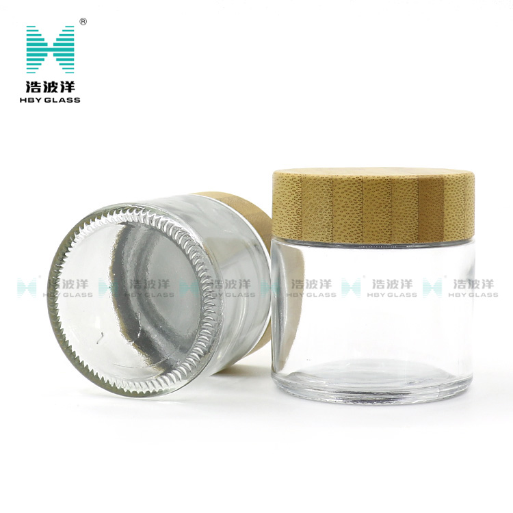 Hot Sale Eco Friendly Custom Logo 50g 100g Empty White Wooden Bamboo Lid Cap Glass Cosmetic Jars