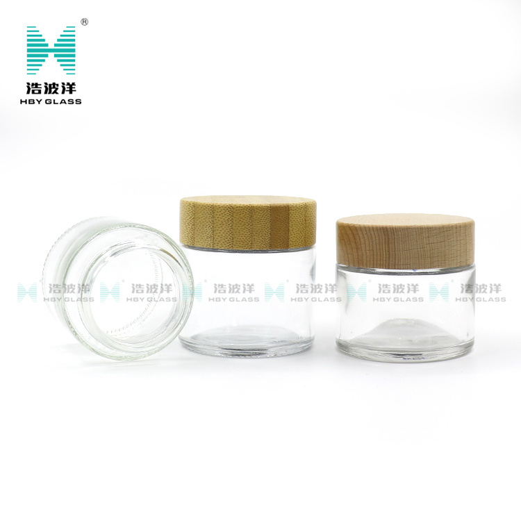 Hot Sale Eco Friendly Custom Logo 50g 100g Empty White Wooden Bamboo Lid Cap Glass Cosmetic Jars