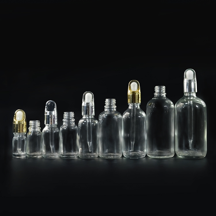 Hot Sale Empty Custom Logo 5ml 10ml 15ml 30ml 50ml 100ml clear essential oil glass Bottles Cosmetics Liquid glass Dropper Bottle