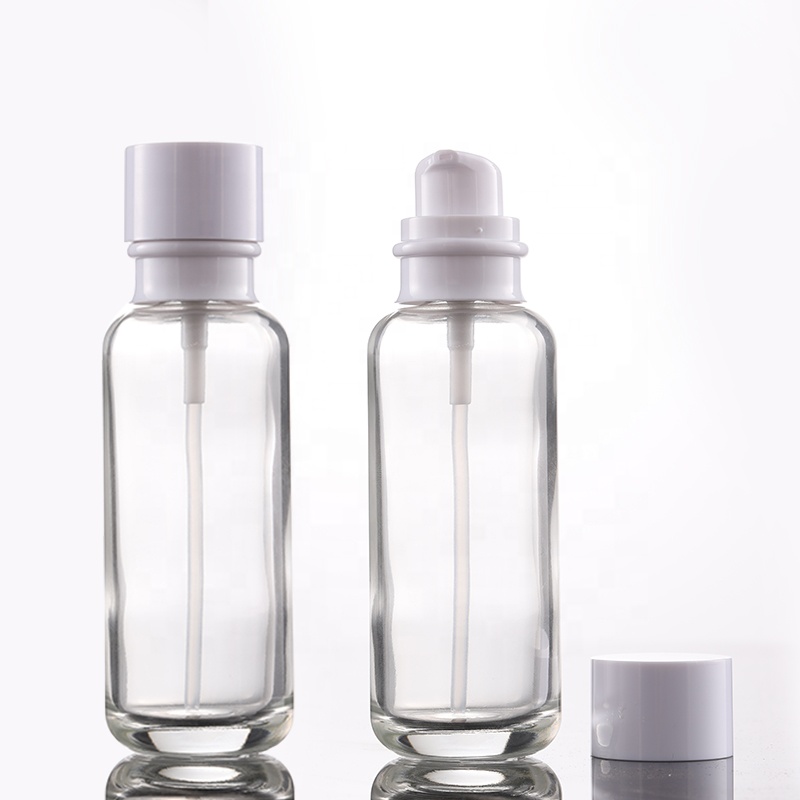 Hot Sale Round Shoulder Clear Cosmetic Glass Lotion Bottle 50g 50ml 110ml 130ml with Pump