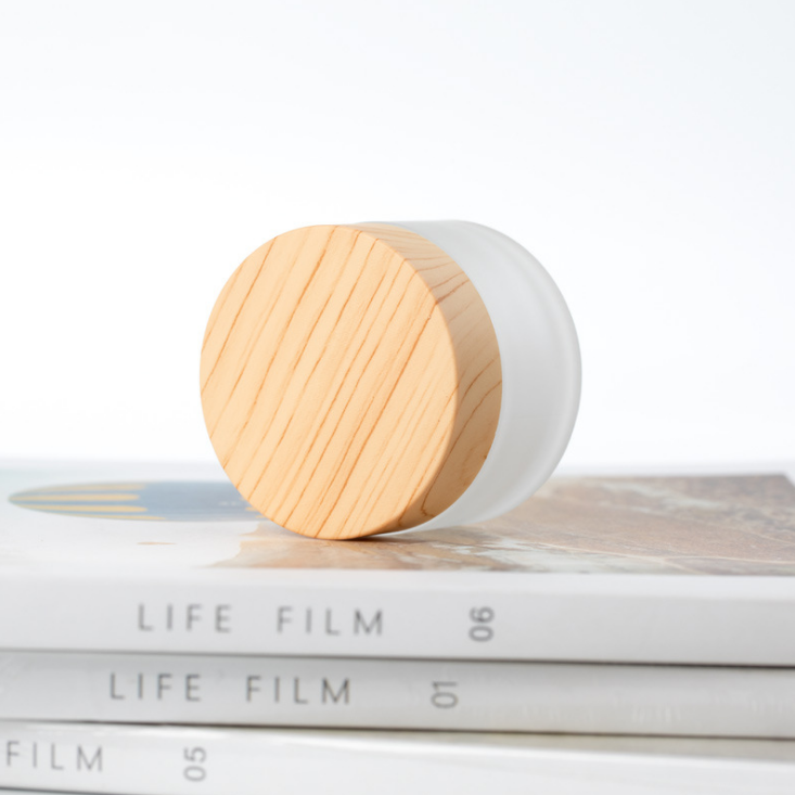 Hot Sale cosmetic jar wooden lid cosmetic glass jar custom cosmetic jar