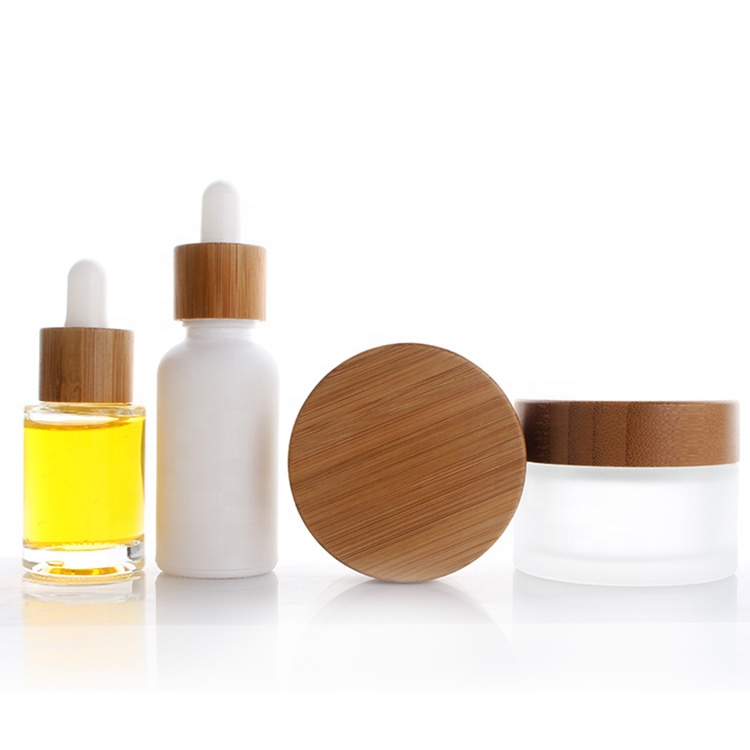 Hot Sell 15ml 30ml 50ml round flat shoulder Glass Essential Oil dropper bottle with wooden lid