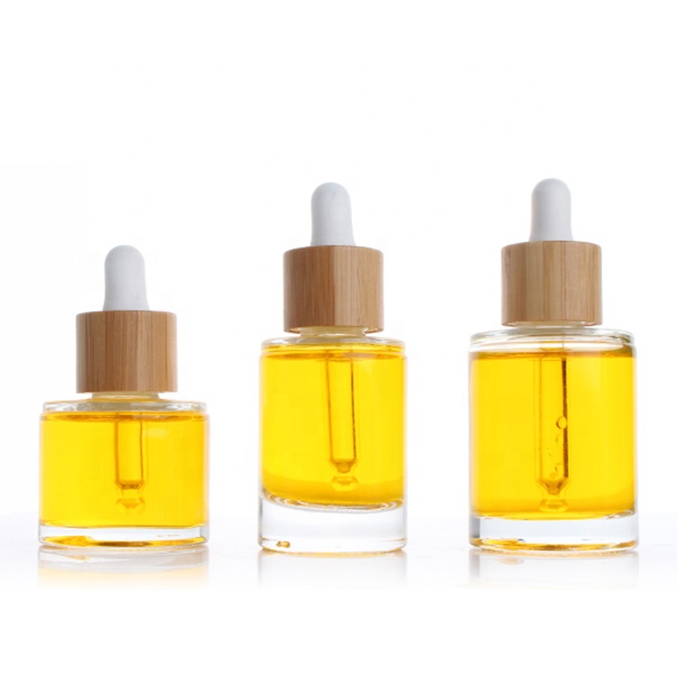 Hot Sell 15ml 30ml 50ml round flat shoulder Glass Essential Oil dropper bottle with wooden lid