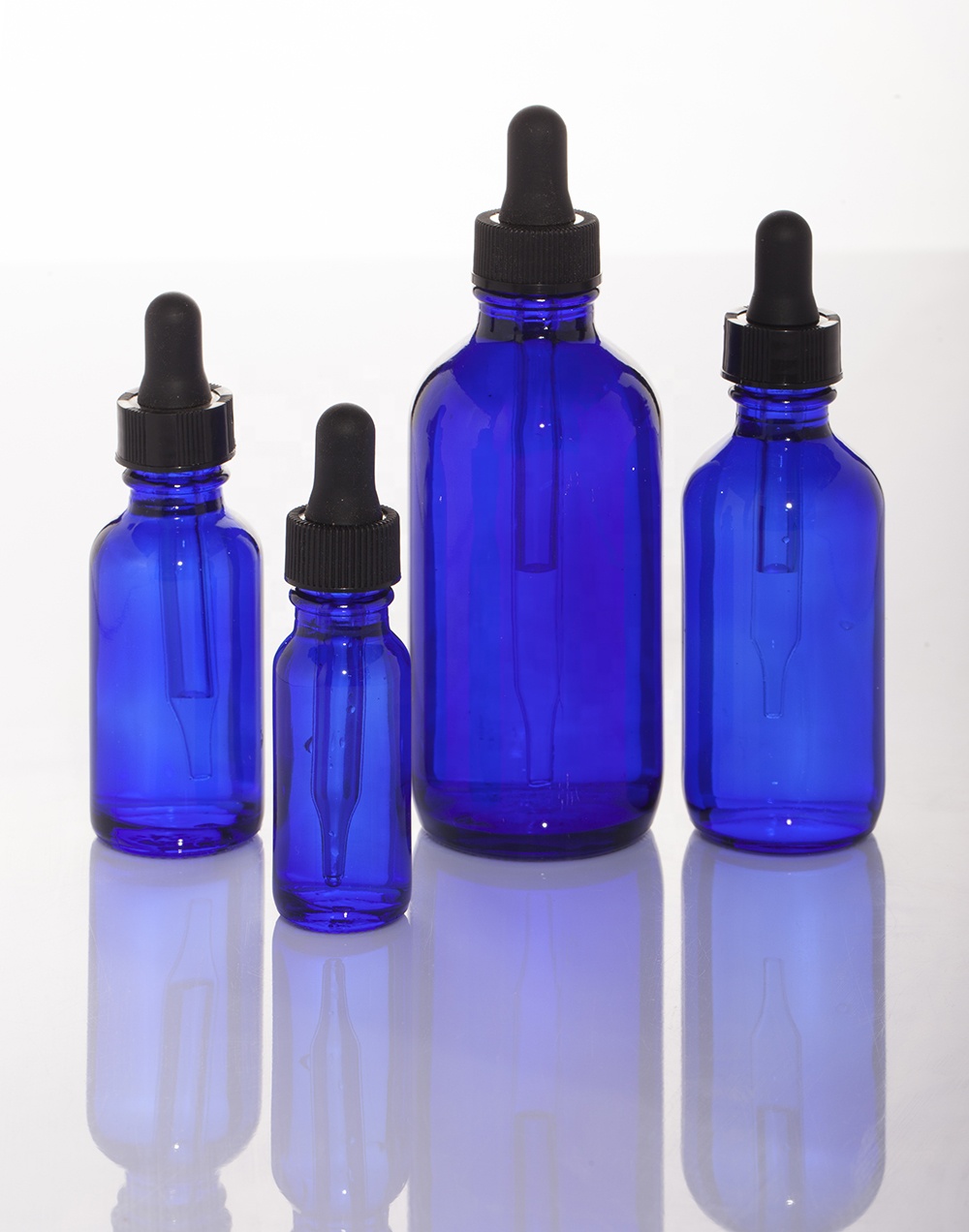 Hot Selling 0.5oz 1oz 2oz 4oz 8oz 16oz 32oz Clear Amber Blue Boston Round Essential Oil Glass Bottle G.P.I Finish
