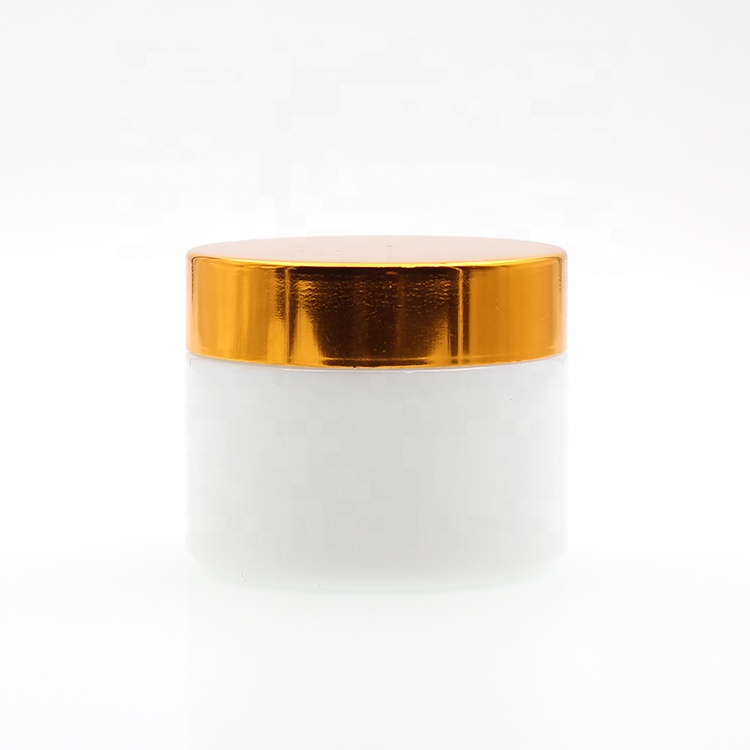 Hot Selling 50g 100g white cosmetic ceramic glass cream jar with plastic lid glass jars and lids aluminum gold cap face care