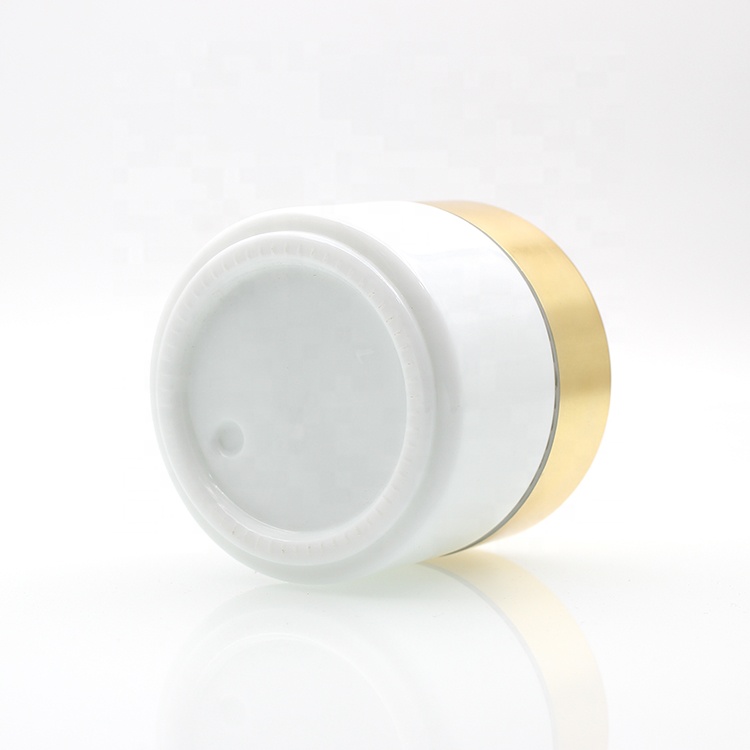 Hot Selling 50g 100g white cosmetic ceramic glass cream jar with plastic lid glass jars and lids aluminum gold cap face care