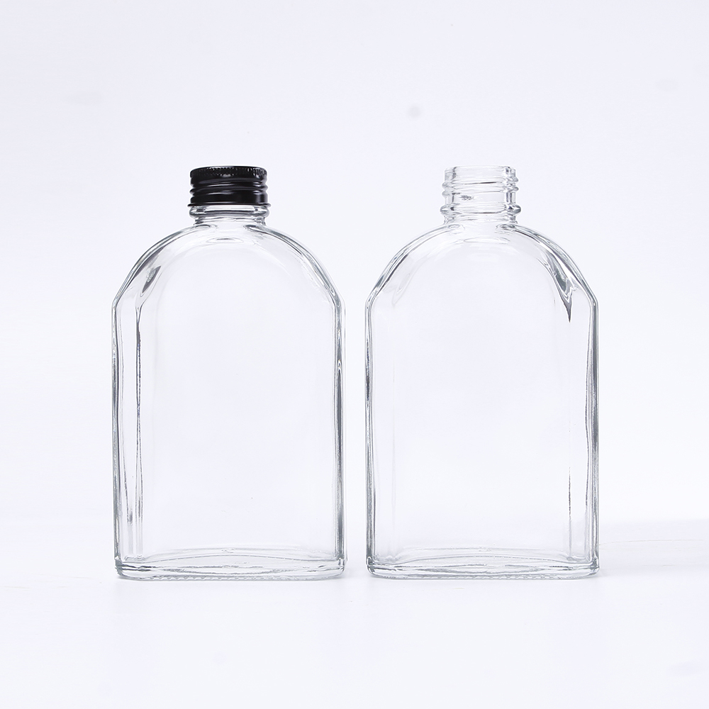 Hot Selling 50ml Mini Beverage Packing Vodka Round Glass Bottle with Aluminium Lid for Whisky Juice Soft Drinks