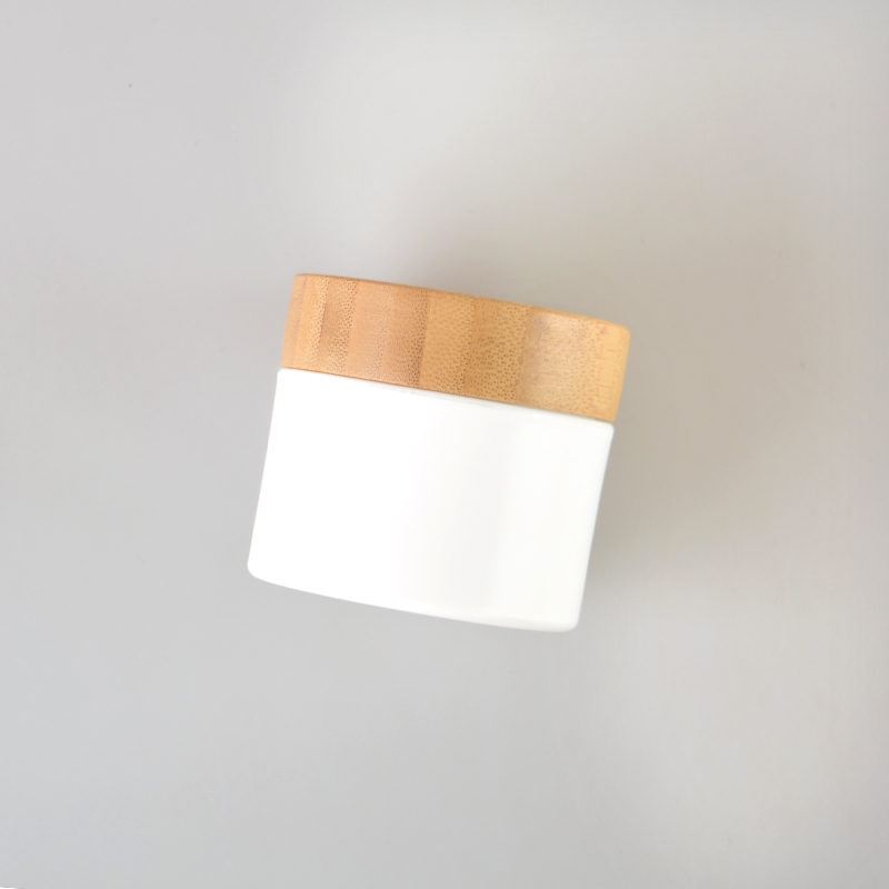 Hot cake cosmetic packaging container plastic cream jars with bamboo lid