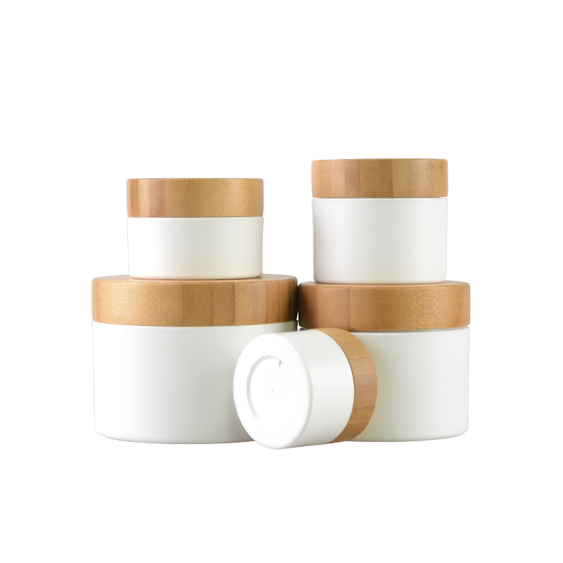 Hot cake cosmetic packaging container plastic cream jars with bamboo lid