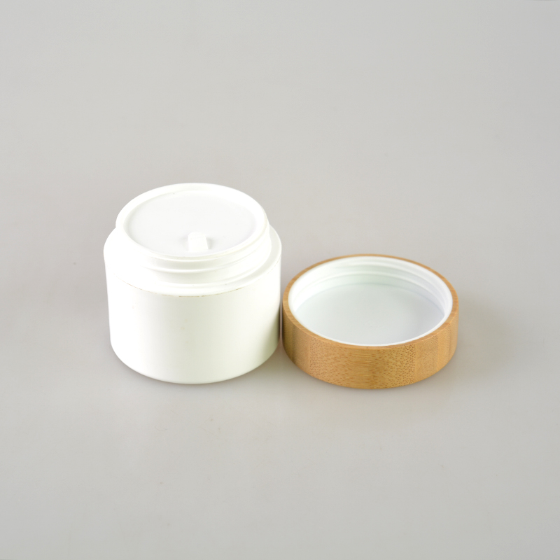 Hot cake cosmetic plastic cream jars with bamboo lid for skincare packaging