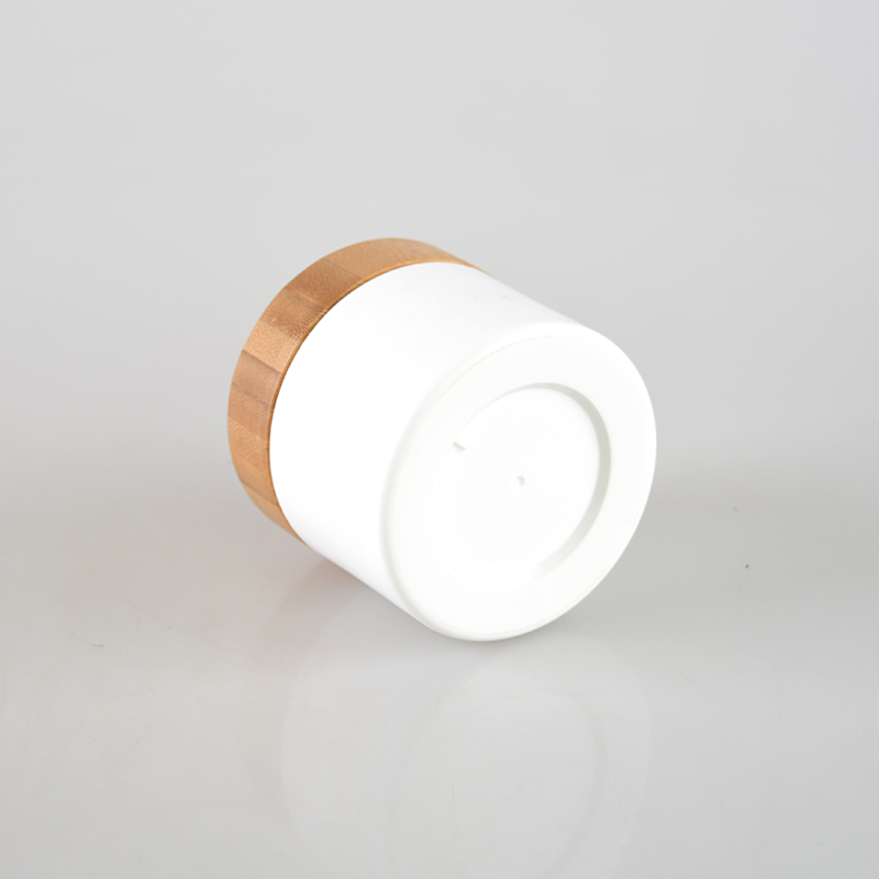 Hot cake cosmetic plastic cream jars with bamboo lid for skincare packaging