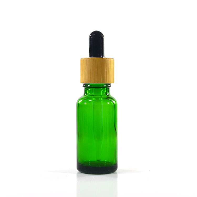 Hot sale 10ml 15ml 30ml 50ml 100ml amber clear green glass dropper bottle with bamboo cap and glass pipette