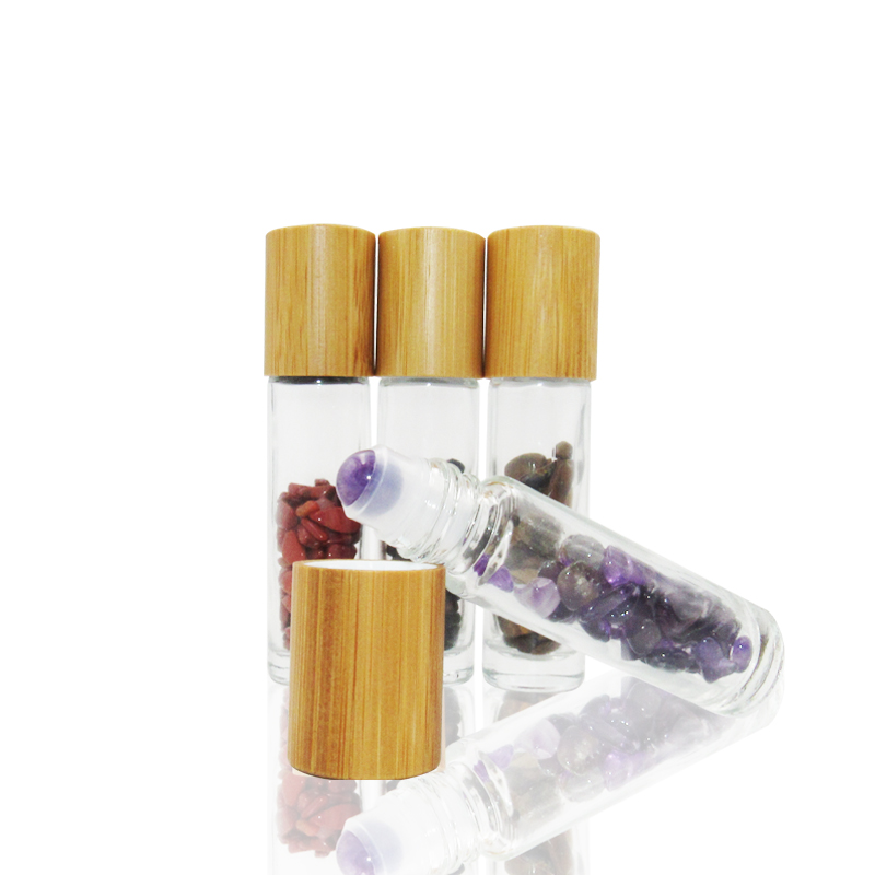 Hot sale 10ml clear transparent glass essential oils perfume gemstones roller ball bottles with bamboo lid