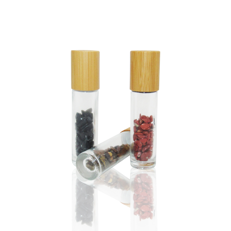 Hot sale 10ml clear transparent glass essential oils perfume gemstones roller ball bottles with bamboo lid