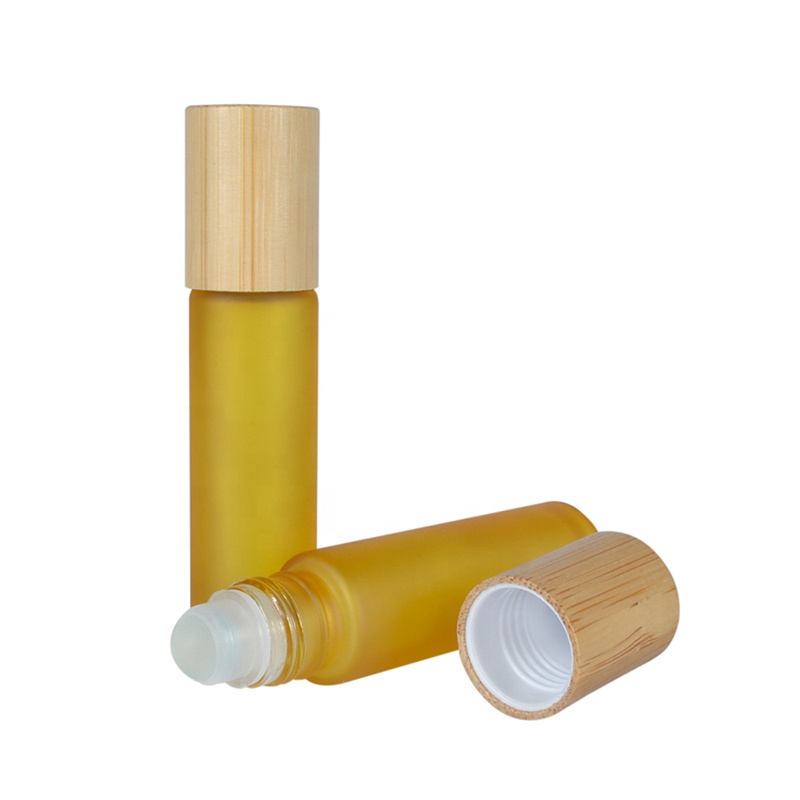 Hot sale 10ml frosted matte pink purple black green colors roll on glass bottle with bamboo cap