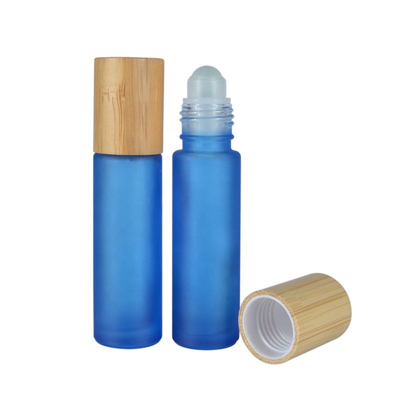Hot sale 10ml frosted matte pink purple black green colors roll on glass bottle with bamboo cap