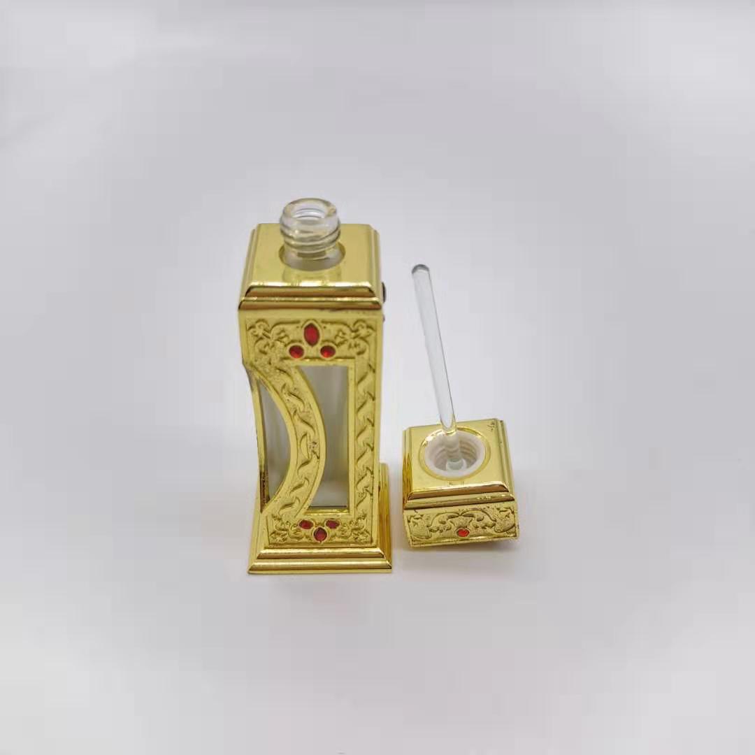 Hot sale 12ml Unique Arabic Style Metal Essential Oil Attar Perfume Glass Bottles with Glass Stick