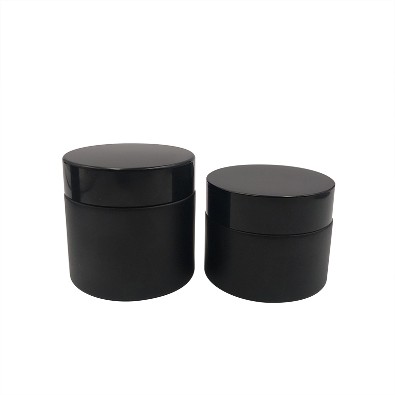 Hot sale 15ml 30ml 50ml 100ml 1oz 2oz frosted clear black glass cosmetic cream jar with black aluminum lid