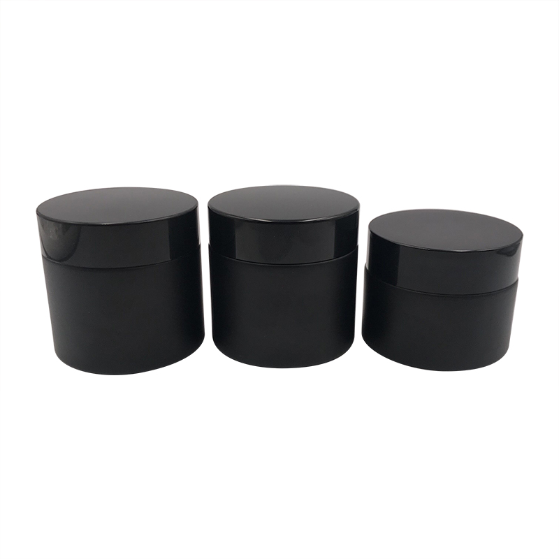 Hot sale 15ml 30ml 50ml 100ml 1oz 2oz frosted clear black glass cosmetic cream jar with black aluminum lid