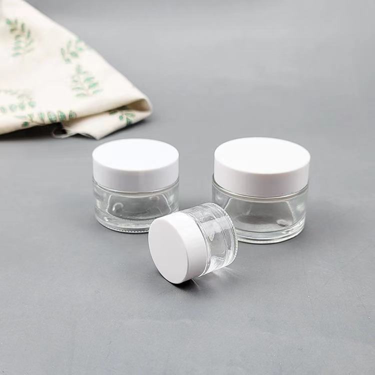 Hot sale 1oz 2oz 5g 10g 15g 20g 30g 50g 60g 100g cosmetic glass cream jar for eye hair and face