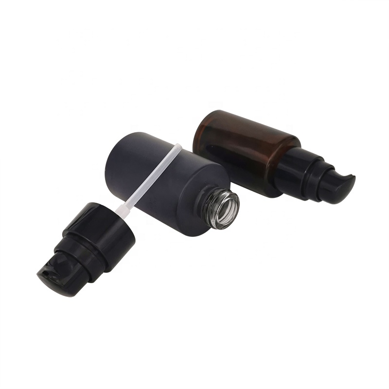 Hot sale 20ml 30ml 40ml 50ml round black matte amber glass plant essential oil bottle with black pump