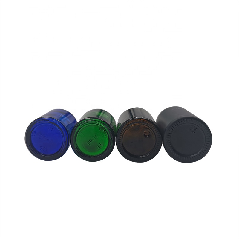 Hot sale 20ml 30ml 40ml 50ml round black matte amber glass plant essential oil bottle with black pump