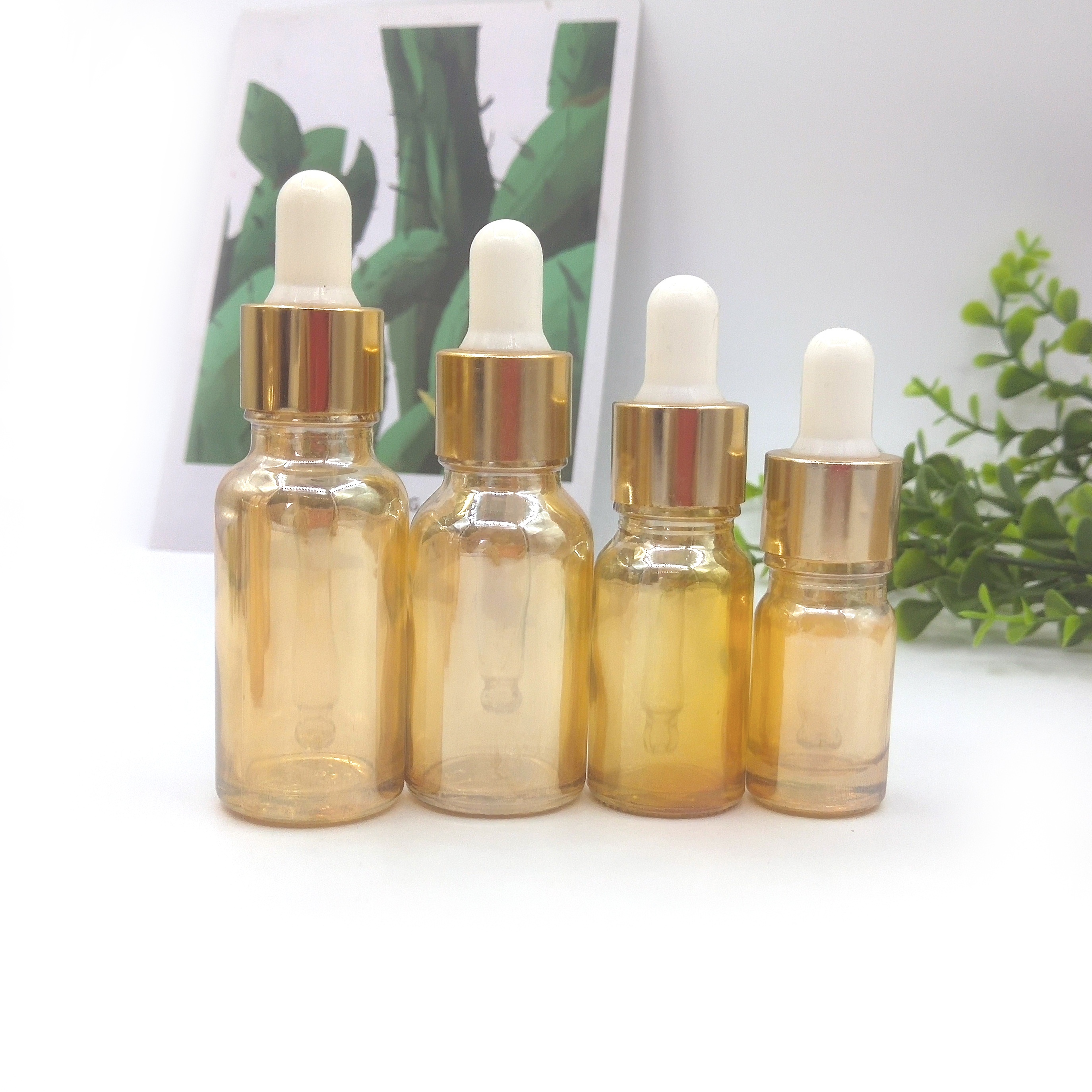 Hot sale 30ml 50ml 100ml glass dropper bottle with silver and gold cap, e liquid glass bottle screw cap
