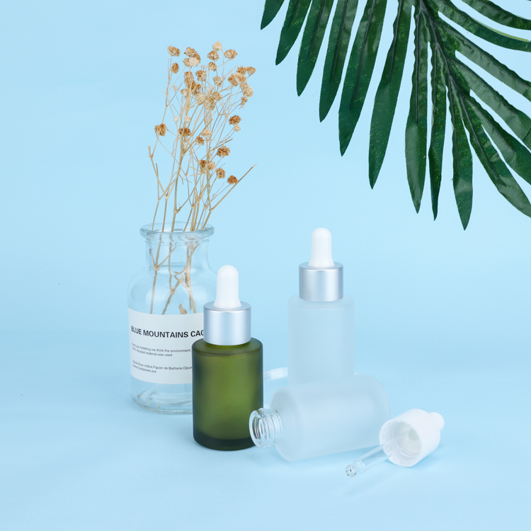 Hot sale 30ml 50ml 60ml serum cosmetic skin care packaging green round matte glass dropper bottles