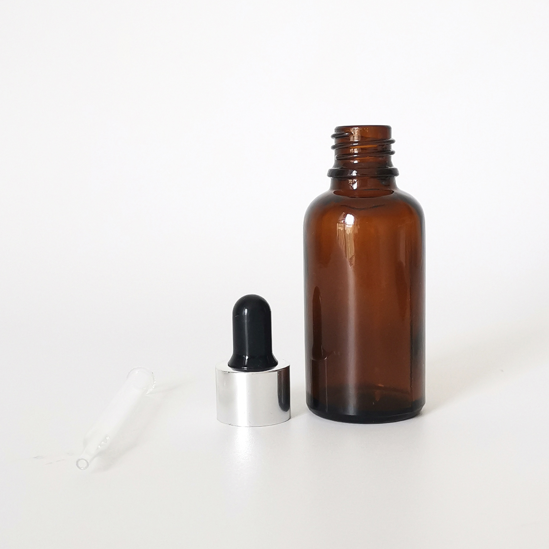 Hot sale 30ml clear amber round press pipette dropper cosmetic glass essential oil dropper bottle with aluminum cap
