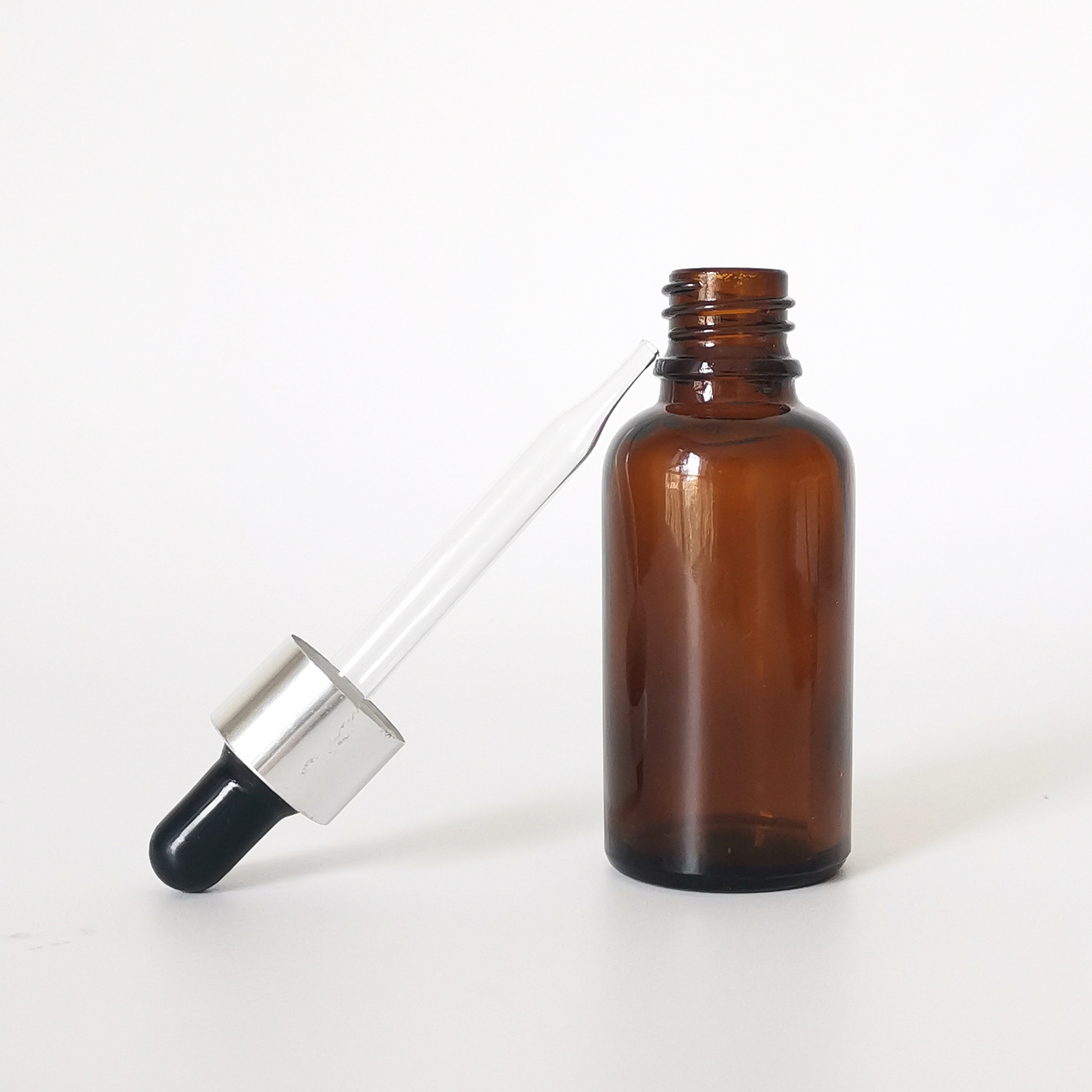 Hot sale 30ml clear amber round press pipette dropper cosmetic glass essential oil dropper bottle with aluminum cap