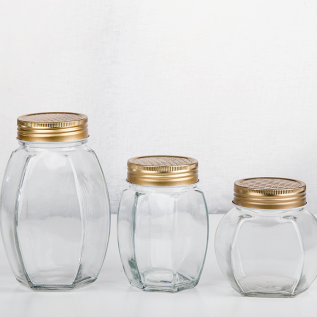 Hot sale 380ml 730ml transparent hexgonal honey glass jar with screw lid