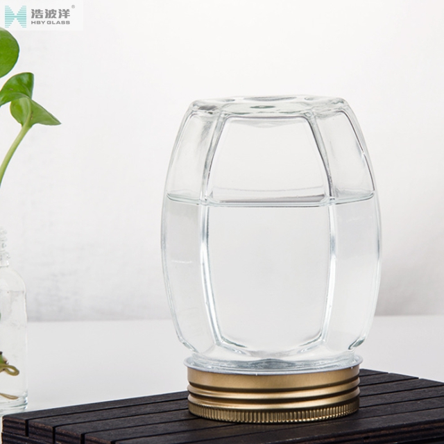 Hot sale 380ml 730ml transparent hexgonal honey glass jar with screw lid