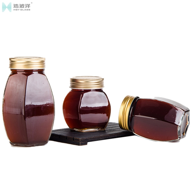 Hot sale 380ml 730ml transparent hexgonal honey glass jar with screw lid