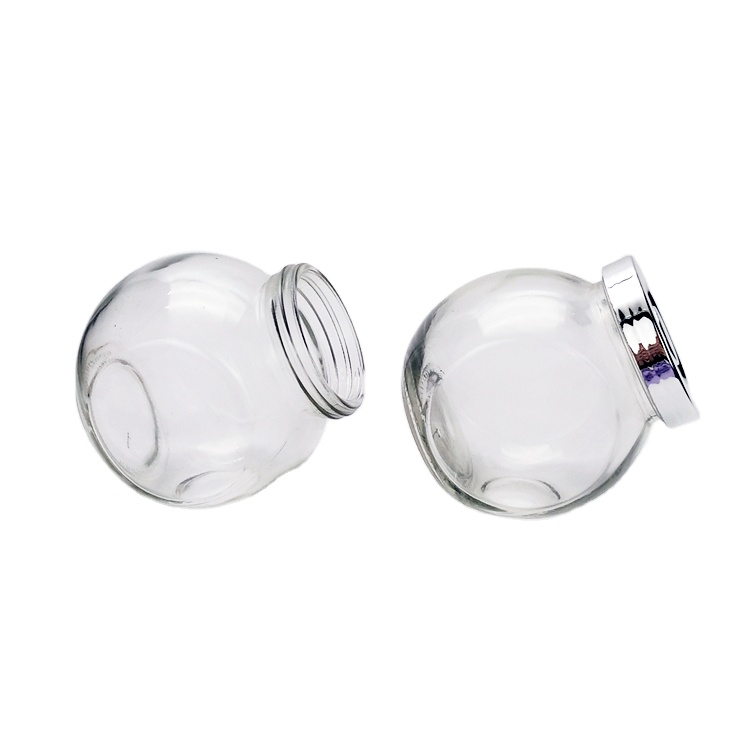 Hot sale 380ml flat drum shaped clear glass storage jar for candy nut honey jam