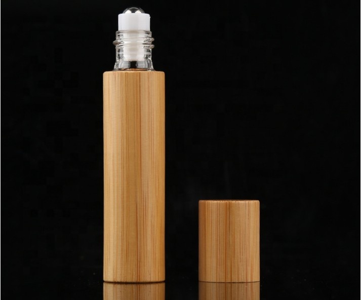 Hot sale 3ml 5ml 10ml small bamboo glass roller ball bottles for cosmetic e liquid perfume essential oil screw cap