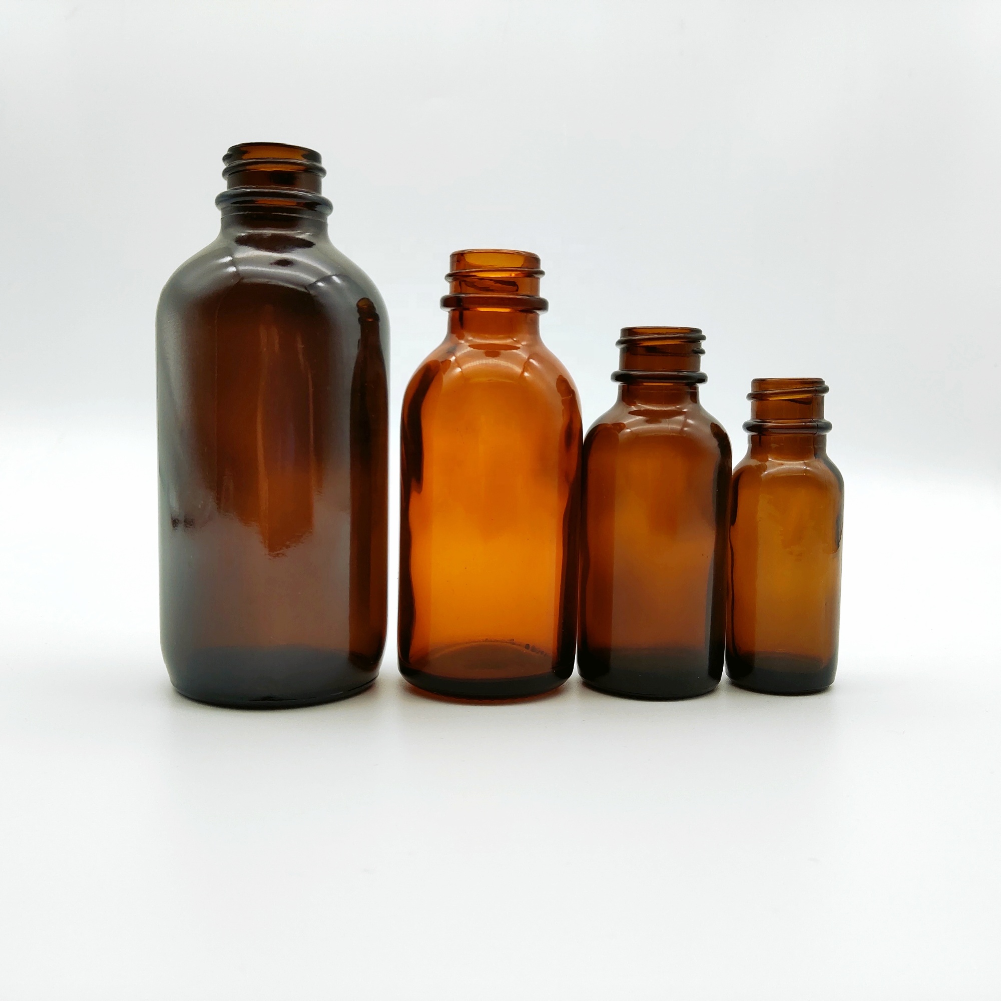 Hot sale 4oz Amber flint boston round glass bottle