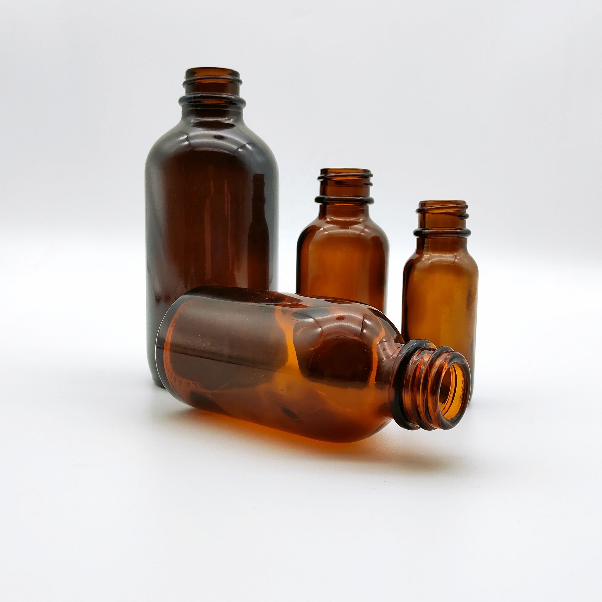 Hot sale 4oz Amber flint boston round glass bottle