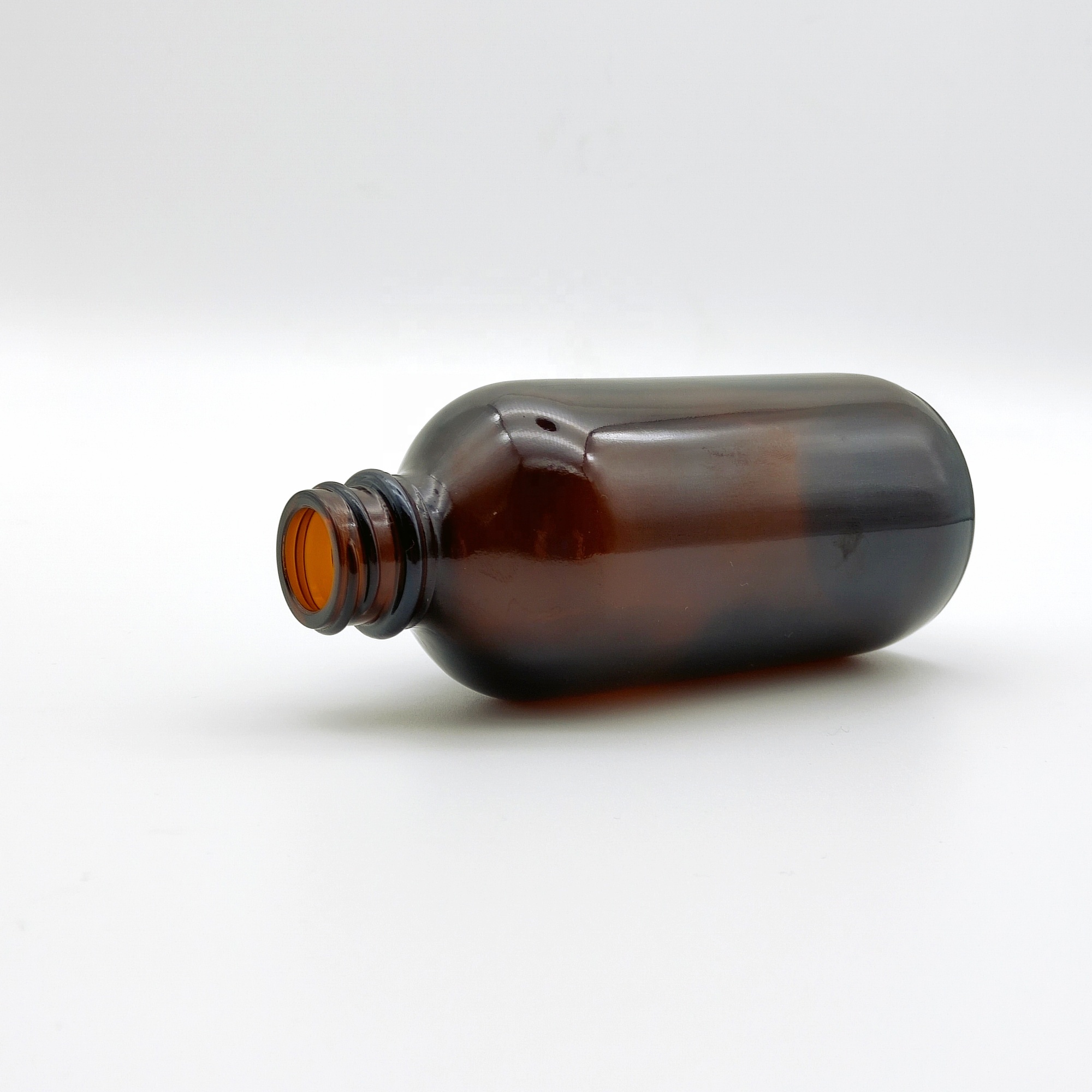 Hot sale 4oz Amber flint boston round glass bottle