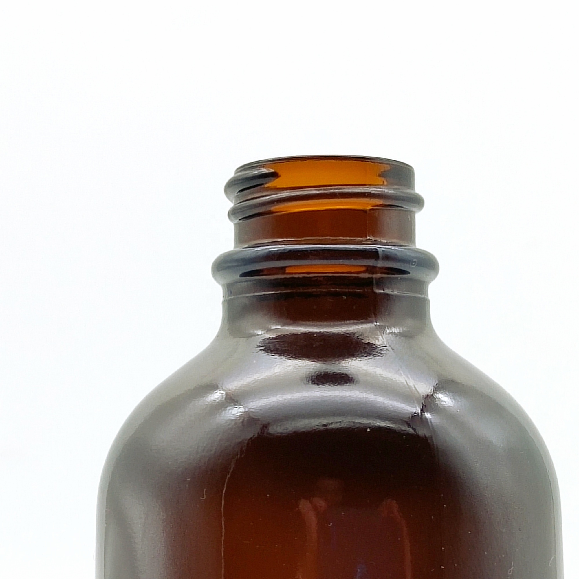 Hot sale 4oz Amber flint boston round glass bottle