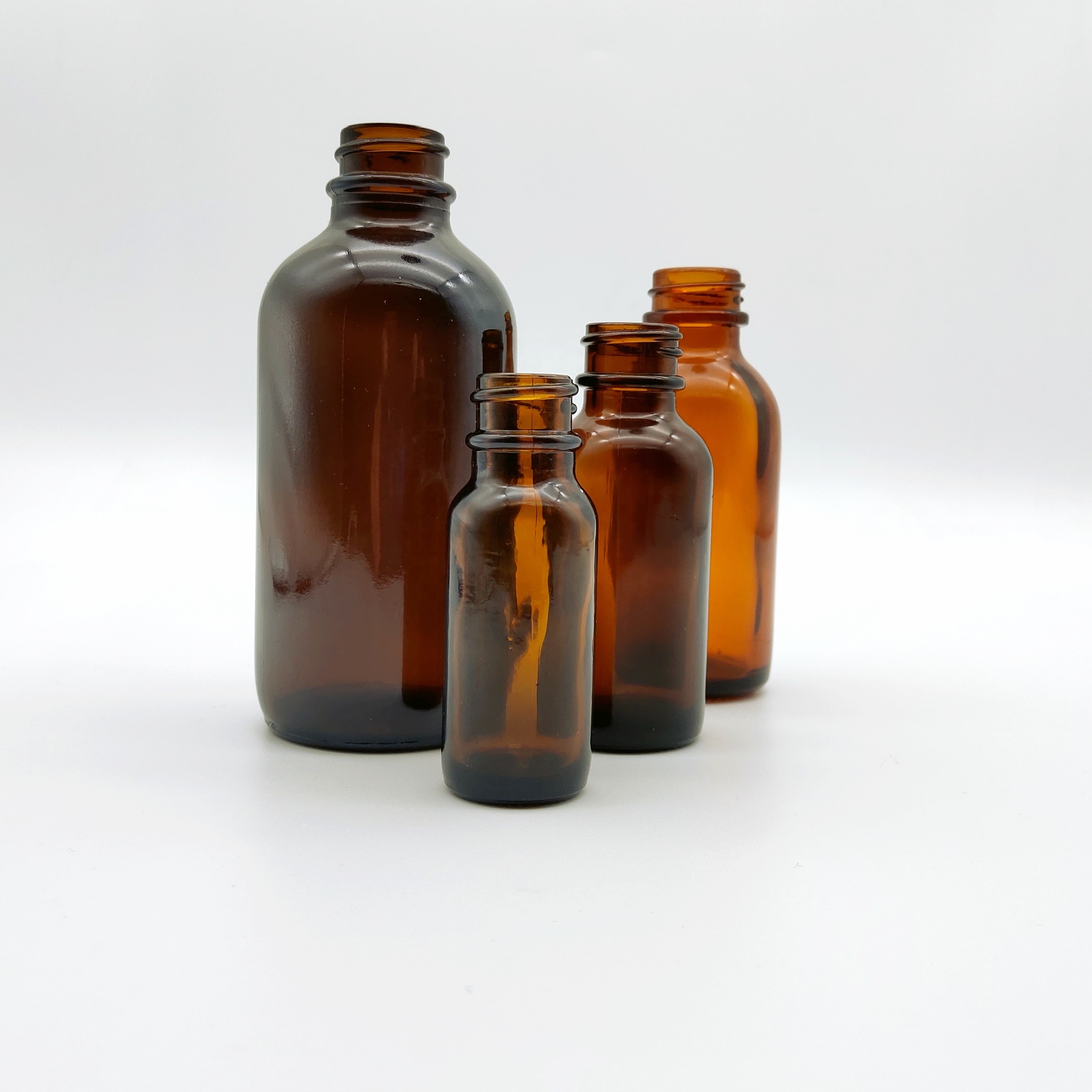 Hot sale 4oz Amber flint boston round glass bottle